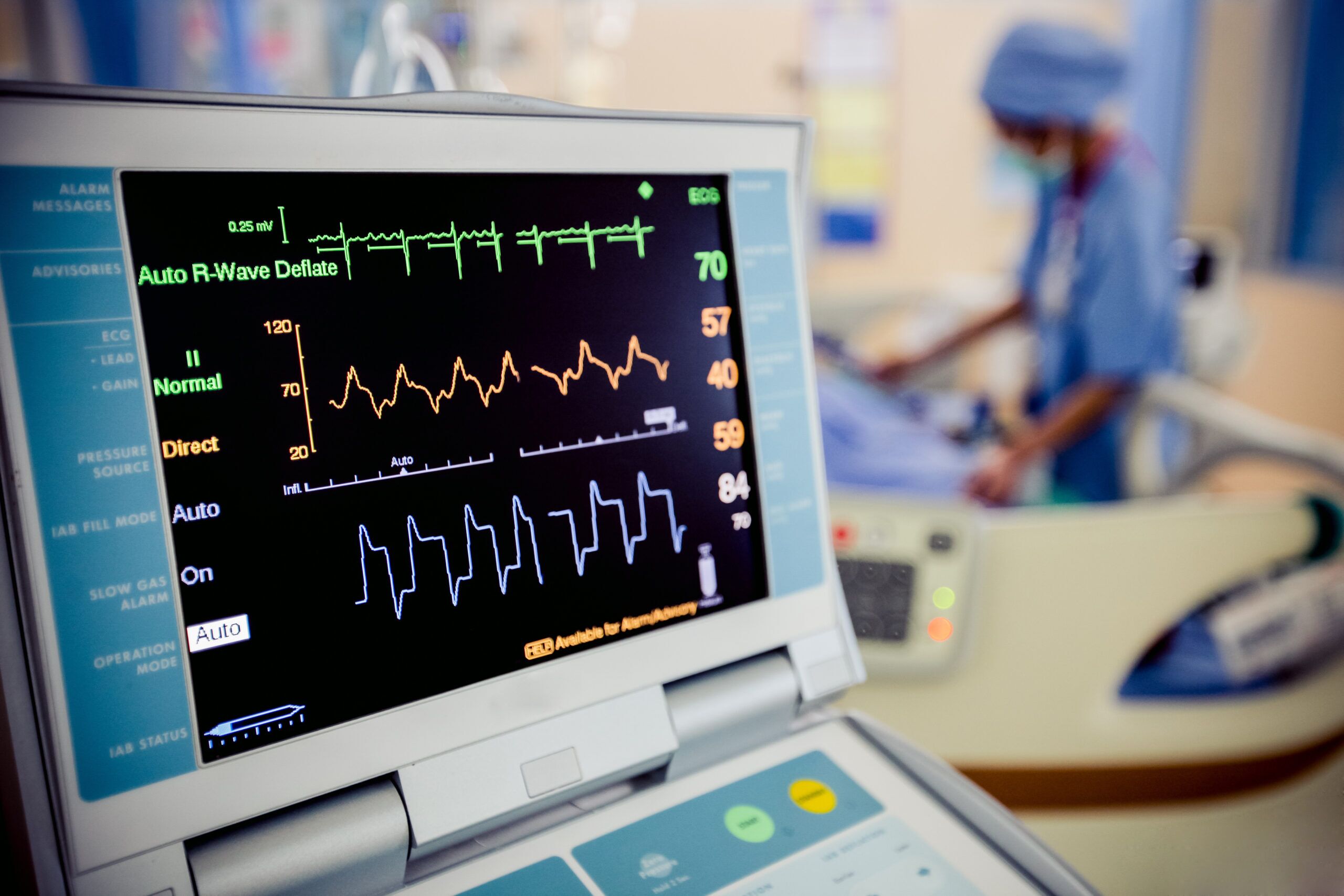 hospital monitor in patients room with attendant